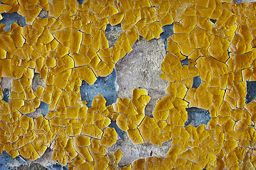 Image showing Cracked oil enamel on an old wall - background