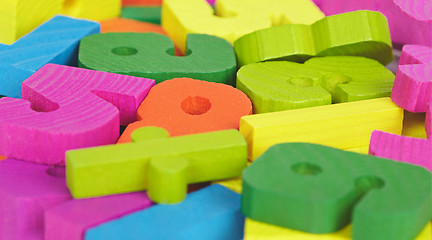 Image showing Colored wooden letters and numbers