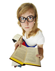 Image showing Girl in old heavy glasses read books
