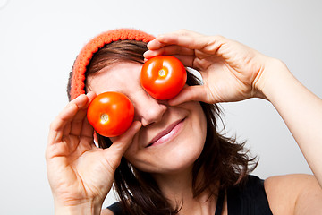 Image showing Young woman with tomato eyes