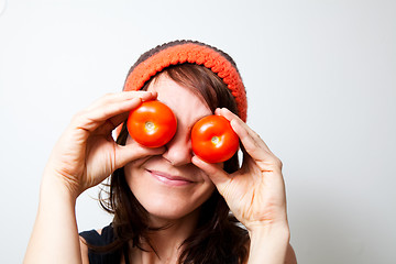 Image showing Young woman with tomato eyes