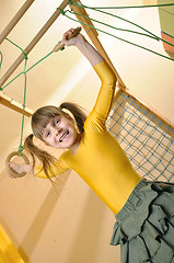 Image showing child at her home sports equipment