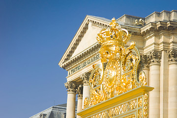 Image showing Golden crown over the gate and Palace in Versailles