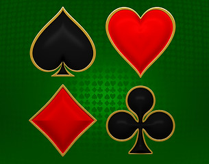 Image showing Card suits with golden framing over green