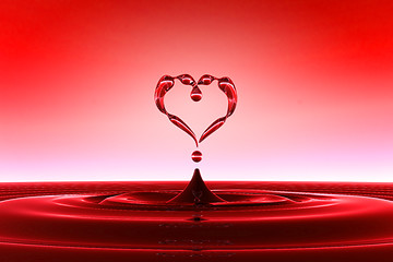 Image showing Heart shaped red water drops