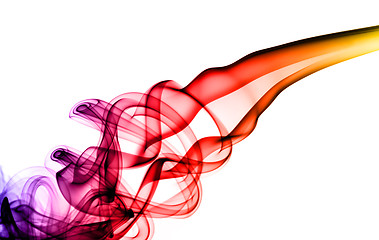Image showing Colorful magic fume swirl on white