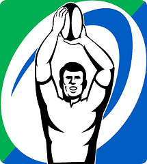 Image showing Rugby player throw line-out ball 
