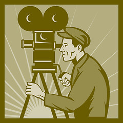 Image showing Vintage movie or television film camera and director