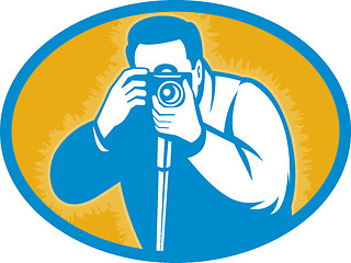 Image showing Photographer with dslr camera
