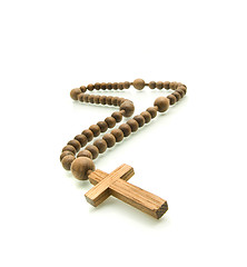 Image showing Wooden rosary beads on white