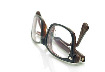Image showing Modern plastic eyeglasses over white