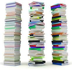 Image showing Education and wisdom. Tall heaps of hardcovered books 