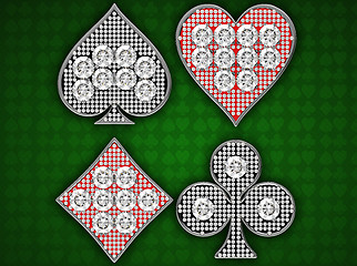 Image showing Diamond Card Suits over green