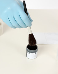 Image showing Fingerprint powder and brush