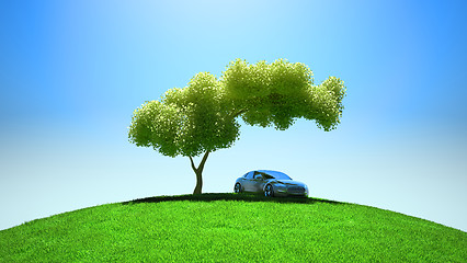 Image showing Modern vehicle under tree on green fileld