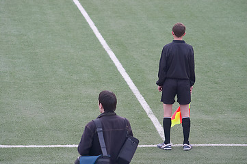 Image showing Referee and photographer
