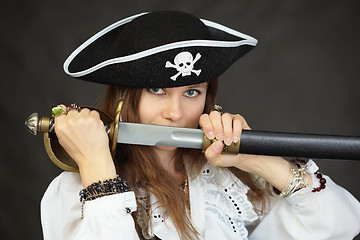 Image showing Woman pirate, demonstrates his sword