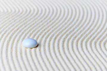 Image showing Abstract composition, glass drop on sand - Zen Garden