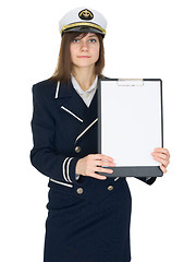 Image showing Woman in sailor suit on white with a tablet in hands