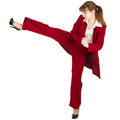 Image showing Beautiful girl in business suit kicks