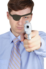 Image showing One-eyed robber threatens us with a pistol on white background