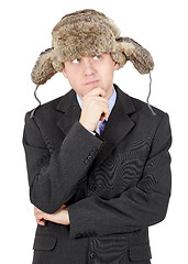 Image showing Thoughtful man on white background with a winter hat