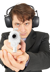 Image showing Businessman aiming a gun, on  white background
