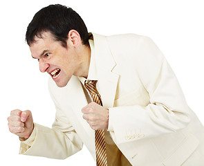Image showing Savage businessman emotionally clenched fists