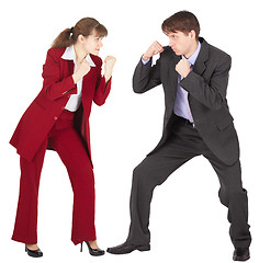 Image showing Man and woman in business suits are going to fight