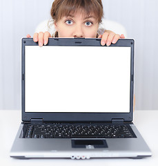 Image showing Woman shows us a blank computer screen