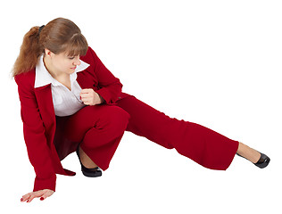 Image showing Woman in business suit kicks