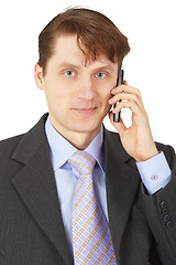 Image showing Man in business suit talking on phone