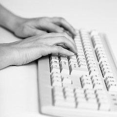 Image showing Two hands prints on computer keyboard
