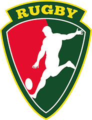 Image showing rugby player kicking ball