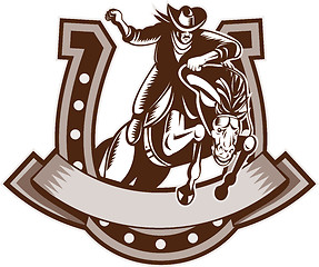 Image showing Rodeo Cowboy riding   bronco horse