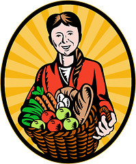 Image showing female organic farmer holding harvest