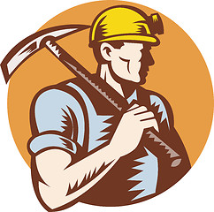 Image showing Coal miner at work with pick ax