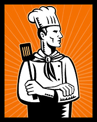 Image showing Retro Chef cook holding spatula
