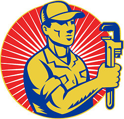 Image showing Plumber holding monkey wrench