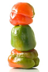 Image showing Three Bell peppers stack on white 