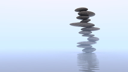 Image showing Mist and Plie of Pebbles on water