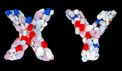 Image showing Medical font X and Y pills letters