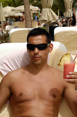 Image showing Man holding drink