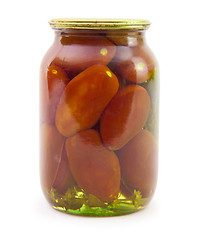 Image showing Marinated tomatoes in glass jar isolated on white background