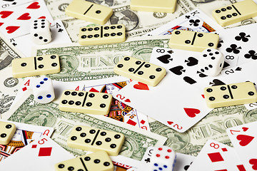 Image showing Cards, money, dominoes and dices