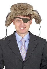 Image showing Laughing, one-eyed man in fur hat, on white background