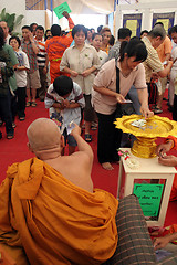 Image showing Collecting donations