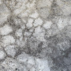 Image showing Stone wall with dirty plaster