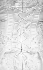 Image showing Lacing on a corset - rear view