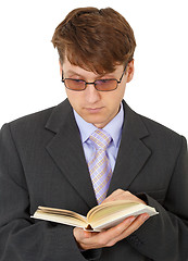 Image showing Guy with glasses reading scientific book